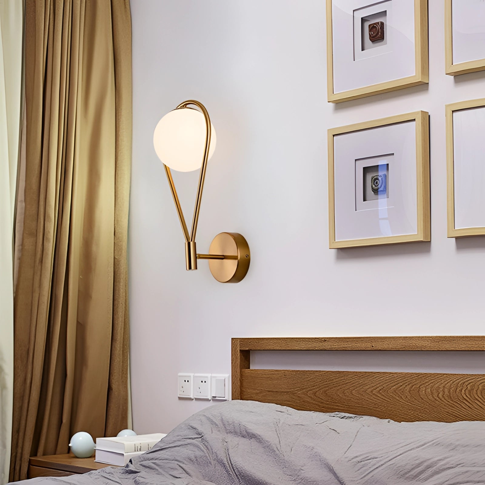 Gold Brass Wall Sconce with Modern Geometric Globe Lamp mounted on a wooden wall, enhancing luxury interior design.