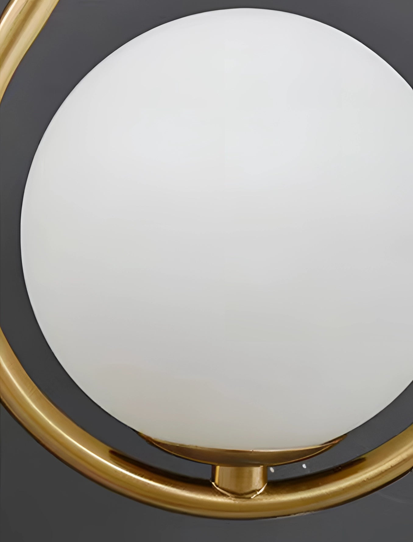 Gold Brass Wall Sconce featuring a modern geometric globe design with luxurious metal finish and symmetrical circular elements.