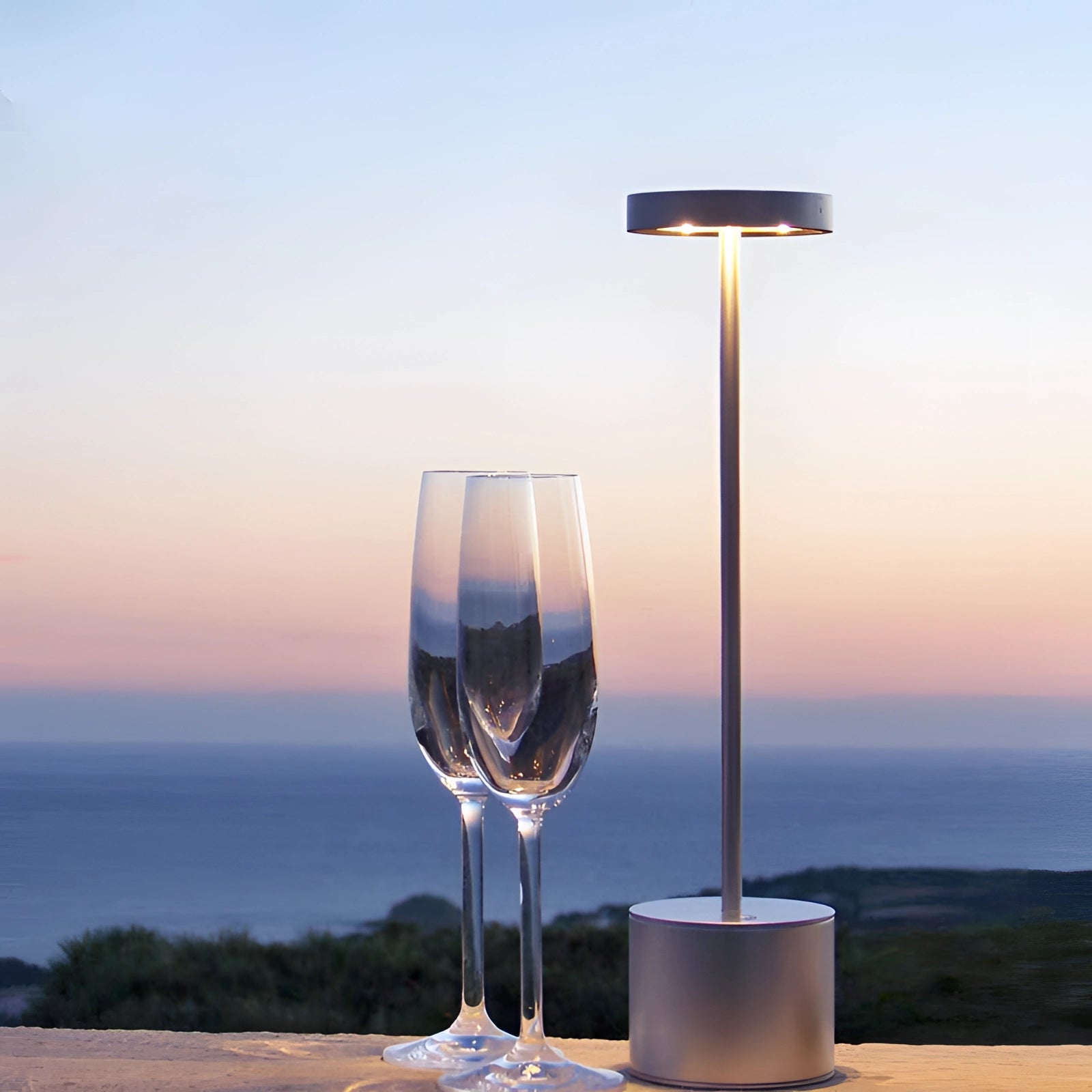 Gold Minimalistic LED Desk Lamp with Circular Head and Brass Finish on a Stylish Desk.