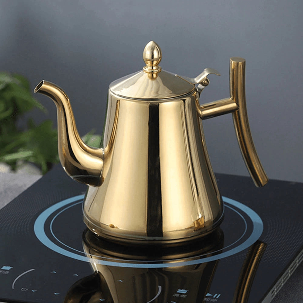 Gold stainless steel luxury teapot with a sleek modern design, ideal for elegant kitchen settings, displayed against a neutral background in a still life composition.