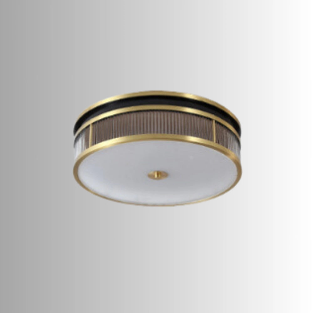 Gold-trimmed circular flush mount ceiling light fixture with elegant design, featuring a metallic finish, suitable for various interior decor styles.