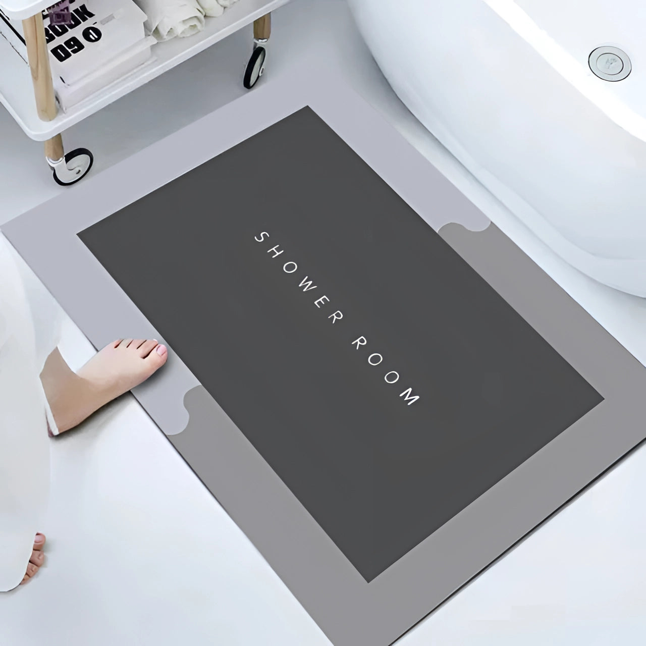 Gray non-slip memory foam bath mat with a rectangular shape, designed to be quick-drying and machine-washable.