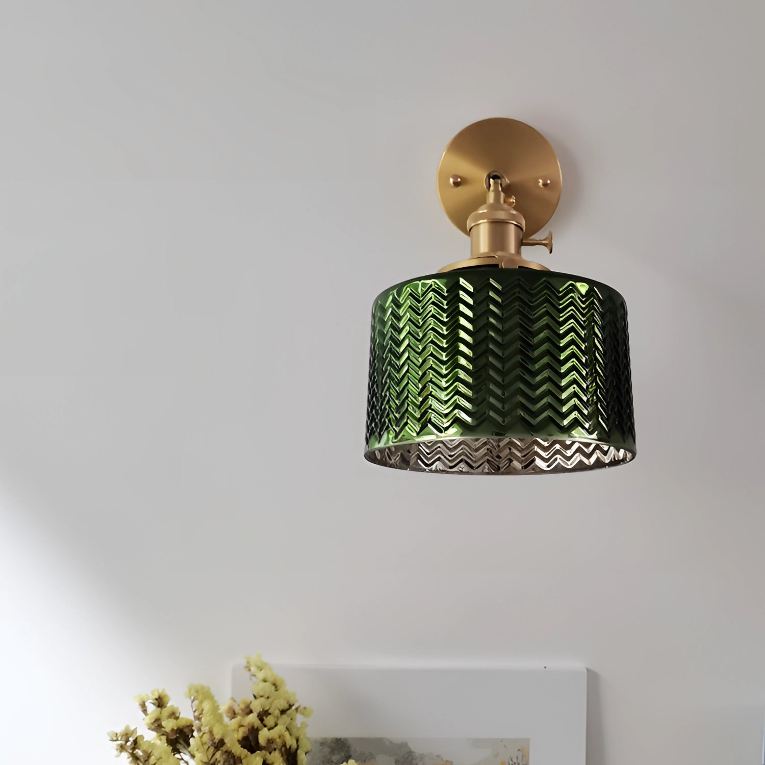 Green Chevron Wall Lamp in a brass finish featuring a geometric pattern with a rectangular design and artistic elements.