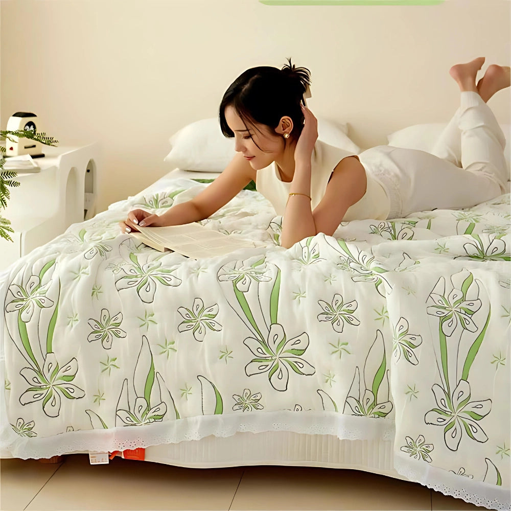 Luxurious green floral bedding set displayed on a bed featuring a designer duvet cover in a 200x230cm size, emphasizing comfort and sophisticated textile design.