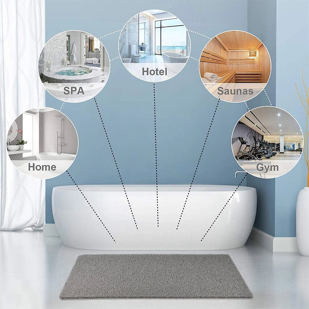 Gray non-slip quick-dry microfiber bathroom mat on a clean bathroom floor, featuring a simple and modern design.