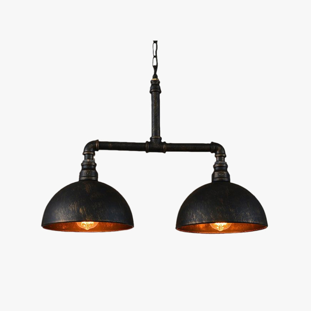 Industrial vintage pipe dual dome black metal pendant light with a stylish design, featuring two metal dome shades and pipe-like elements, perfect for adding a rustic touch to interior spaces. The pendant light is suspended from the ceiling and provides ambient lighting with a vintage appeal.