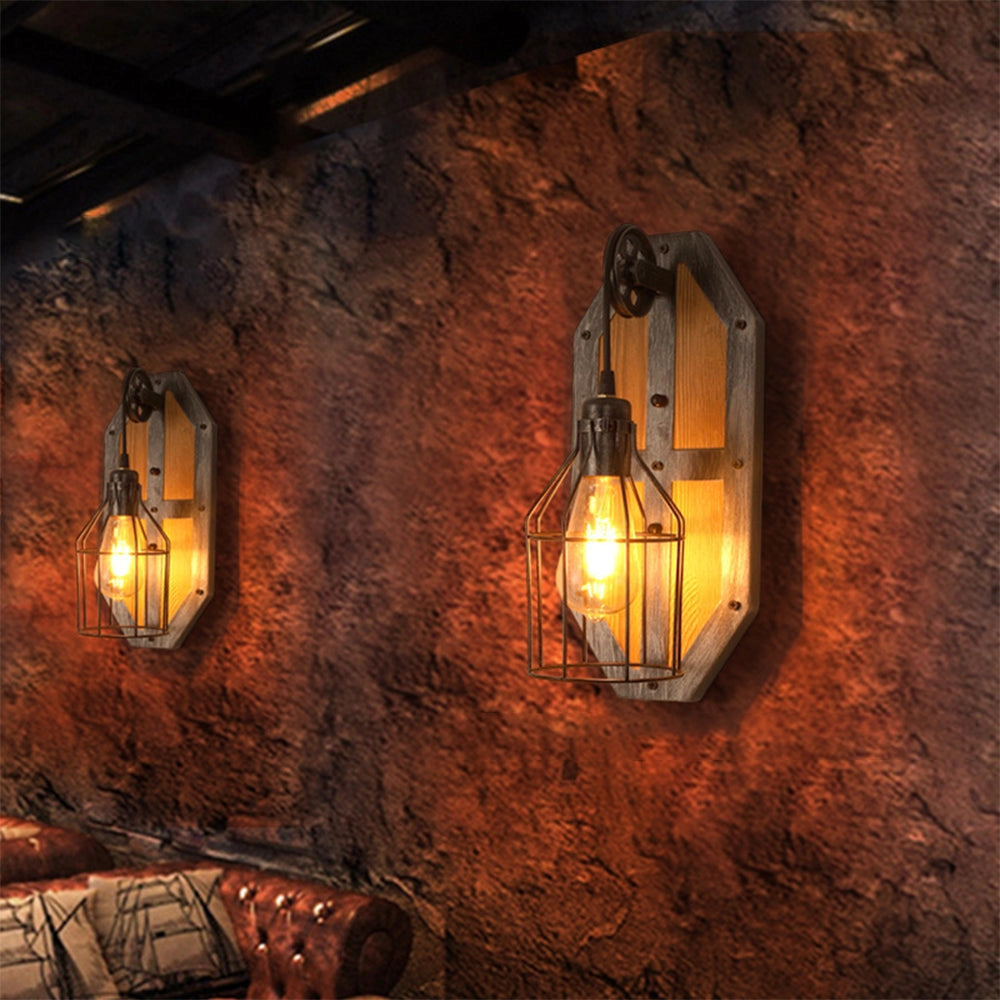 Industrial vintage pulley wall lamp featuring rustic wood and metal design, with warm amber glow for a cozy ambiance.