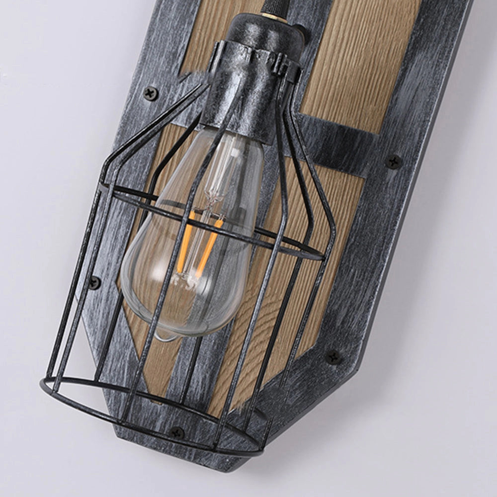 Industrial vintage pulley wall lamp with rustic wood and metal sconce, featuring a cylindrical design and incorporating elements of glass and metal, resembling a traditional lantern style light fixture.