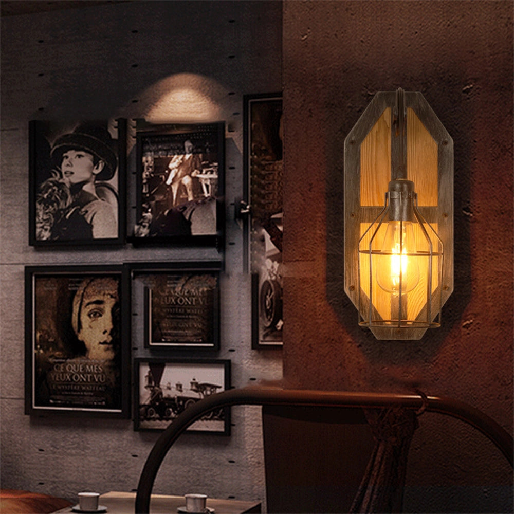Industrial vintage pulley wall lamp with a rustic wood and metal sconce, featuring a brown finish, mounted on a wall and illuminating an interior space.
