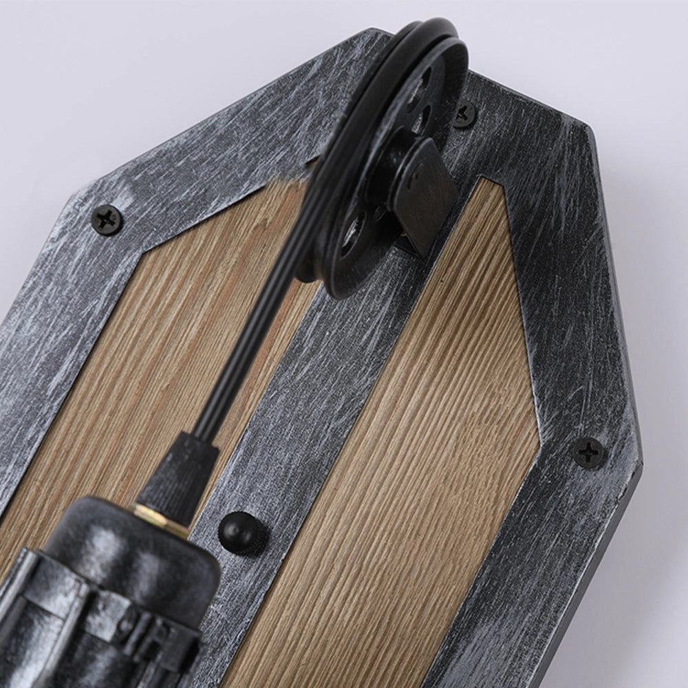 Industrial vintage pulley wall lamp featuring a rustic design with a combination of wood and metal elements, showcasing a rectangular shape and a weathered wood finish.