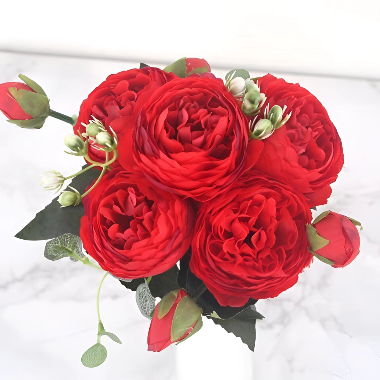 
An elegant red and ivory silk floral set featuring realistic artificial peonies and roses, crafted for luxury weddings and special occasions. The bouquet is meticulously arranged to provide a timeless and sophisticated touch to any event.