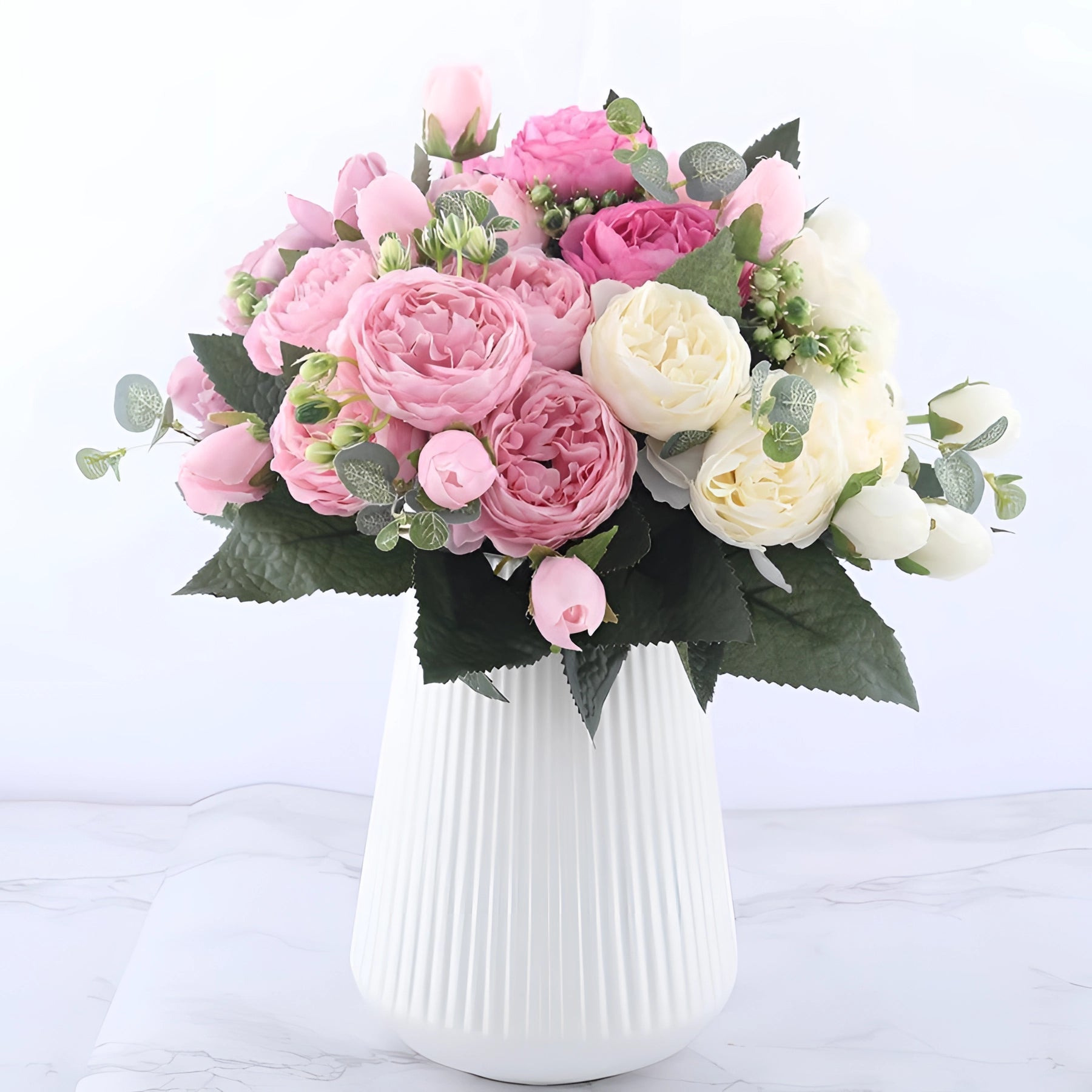 Ivory peony and hybrid tea rose silk floral arrangement in a vase, featuring soft pink hues, perfect for weddings and special occasions.