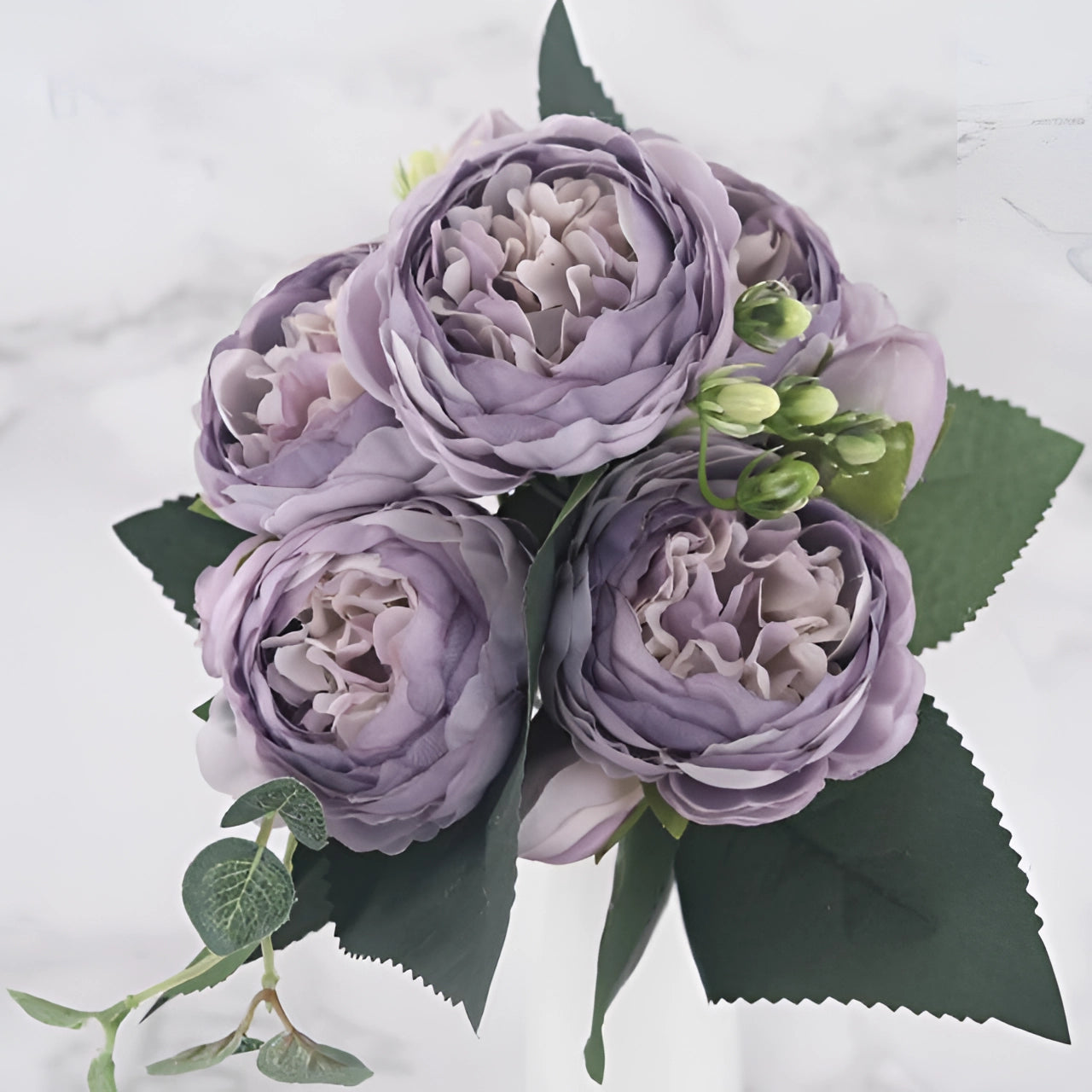 Ivory Peony Silk Floral Set featuring delicate purple thistle accents, showcasing a luxurious and elegant arrangement ideal for weddings and special occasions. The set includes realistic artificial flowers with ivory peonies and violet-hued petals, perfect for bouquets or floral decorations.