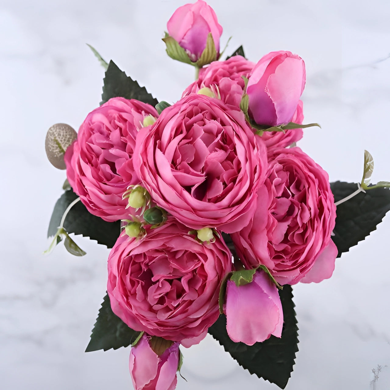 Ivory Peony Silk Floral Set in Hot Pink, featuring lifelike artificial flowers with vibrant pink and magenta petals, elegantly arranged to resemble a luxurious wedding bouquet.