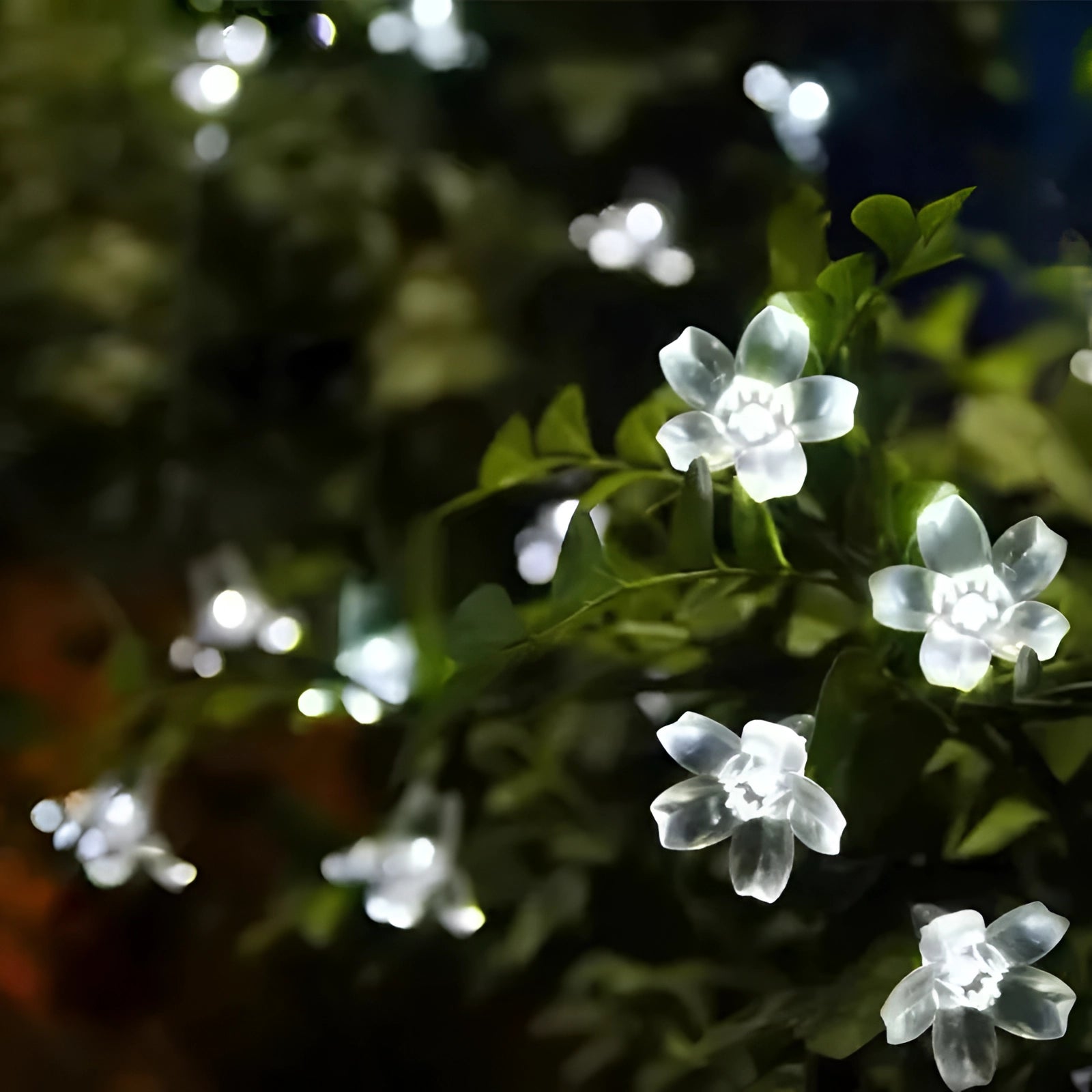 LED blossom tree lights featuring cold white illumination with 100 LED lights spread across a 12-meter length, showcasing decorative flower petal designs suitable for outdoor use.