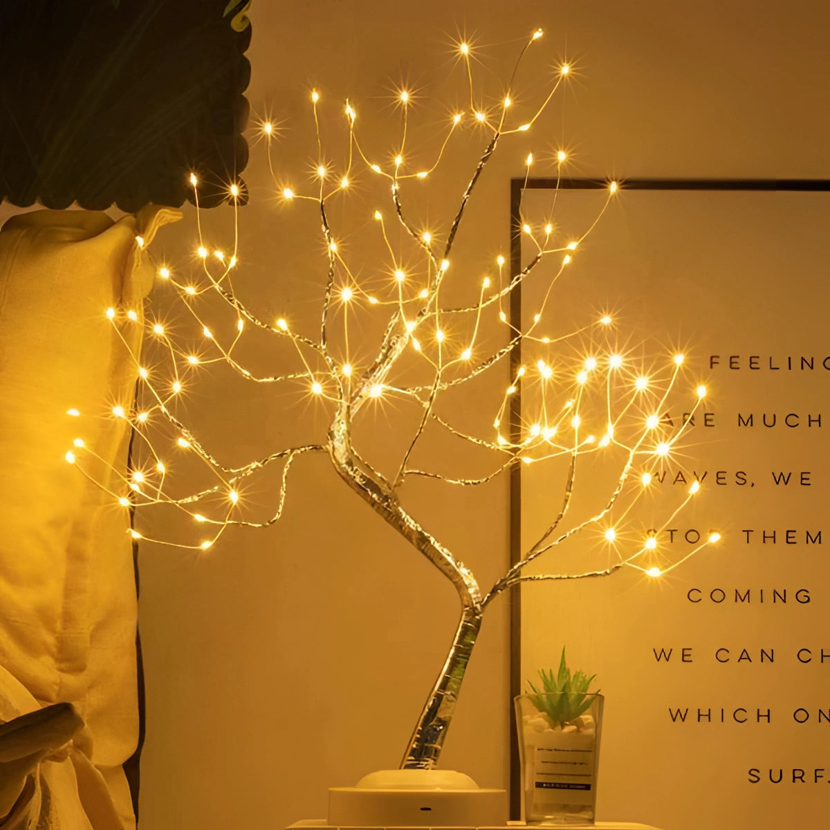 LED bonsai tree light with warm white LEDs on a tabletop, featuring realistic branches and twigs, USB powered, decorated in a flowerpot, suitable for room decoration and adding artistic ambiance.