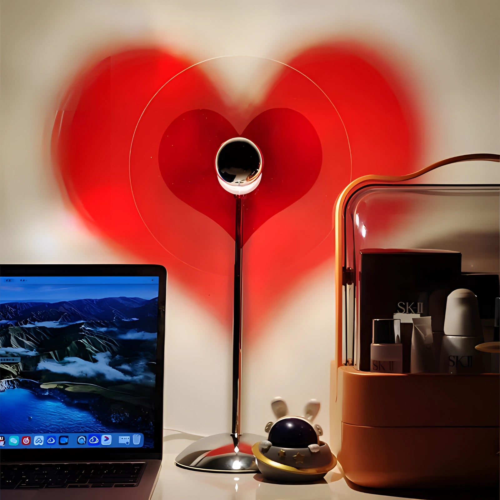 LED heart projector lamp with glowing heart pattern, ideal for romantic home decor, sitting on a desk in a cozy room setting.