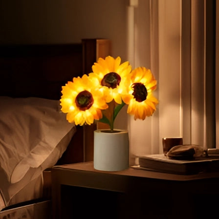 LED sunflower lamp with bright amber and orange petals, designed for home decor as a USB charging night light, featuring a flowering plant motif that enhances interior design.