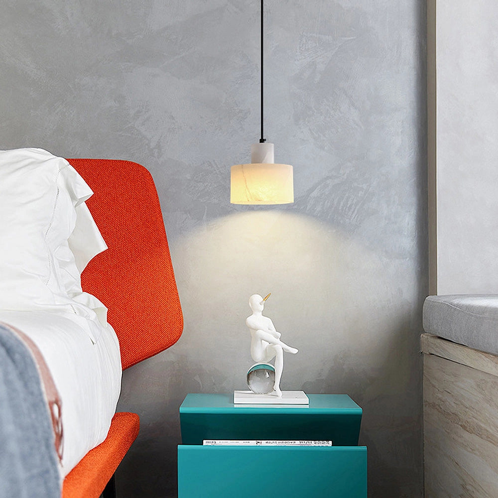 Luxury Alabaster Pendant Light made of natural stone, minimalist design hanging from the ceiling, featuring a sleek rectangular shape with a grey hue.