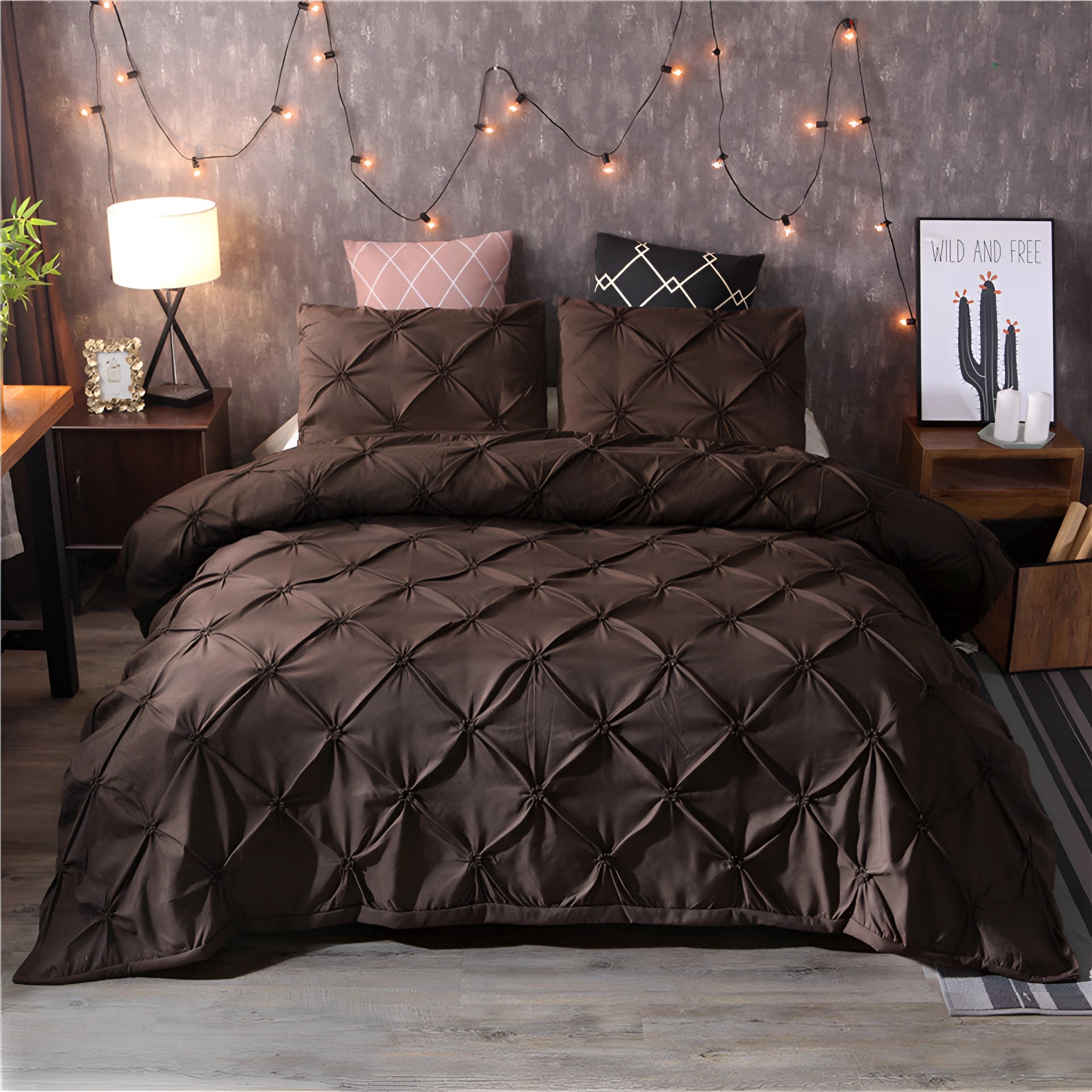 Luxury black pinch pleat comforter in a coffee color scheme, draped over a bed with a modern geometric design, styled within a cozy and elegant interior featuring wooden furniture, soft lighting, and decorative houseplants.