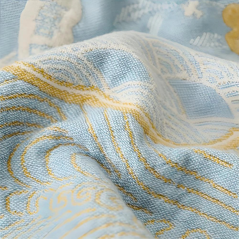 Luxury blue bedding set featuring an ornate gold floral pattern, highlighting an electric blue color with intricate woven fabric design.