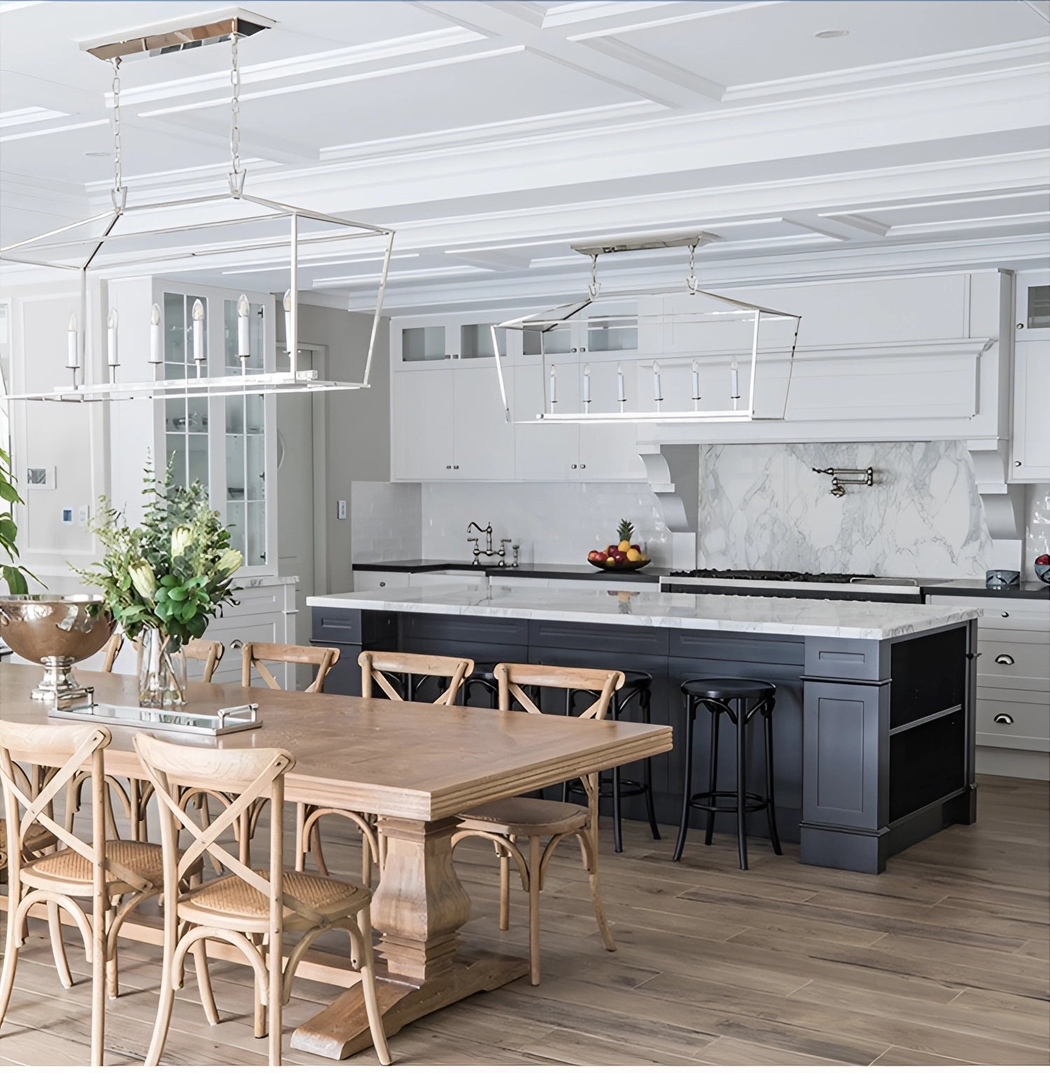 Elegant luxury brass geometric pendant chandelier with LED lights hanging above a modern interior setting, featuring furniture elements such as a table and cabinetry, complemented by a flowerpot and window.