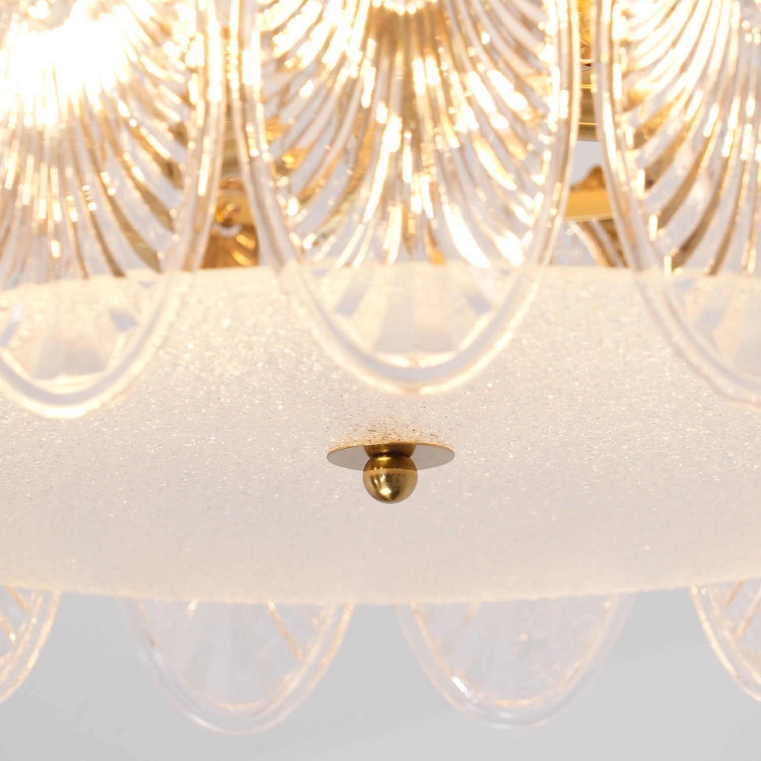 Luxury Crystal Chandelier with Gold Leaf Vintage Design Hanging from White Ceiling