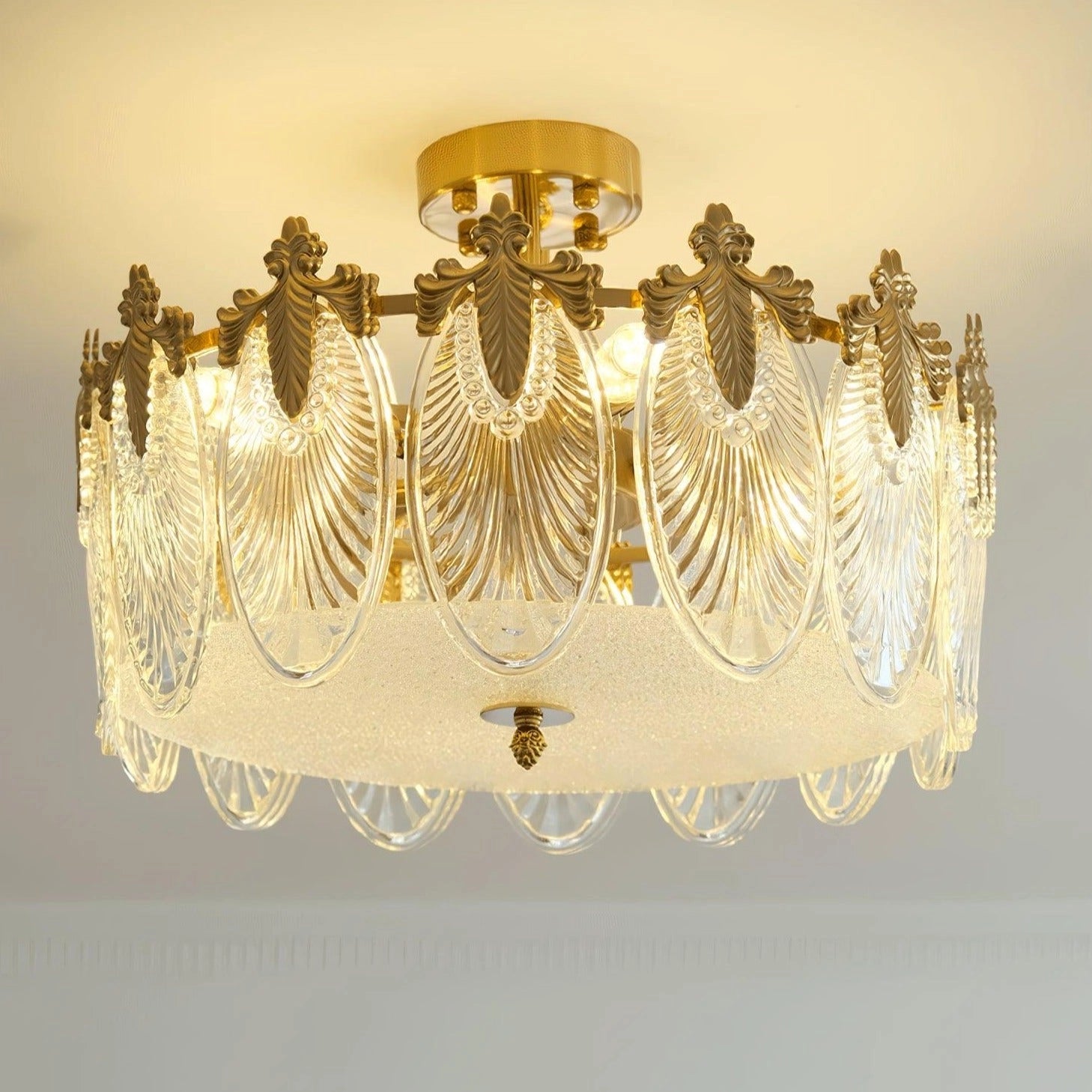 Luxury crystal chandelier with gold leaf vintage design, rectangular shape, hanging from ceiling.