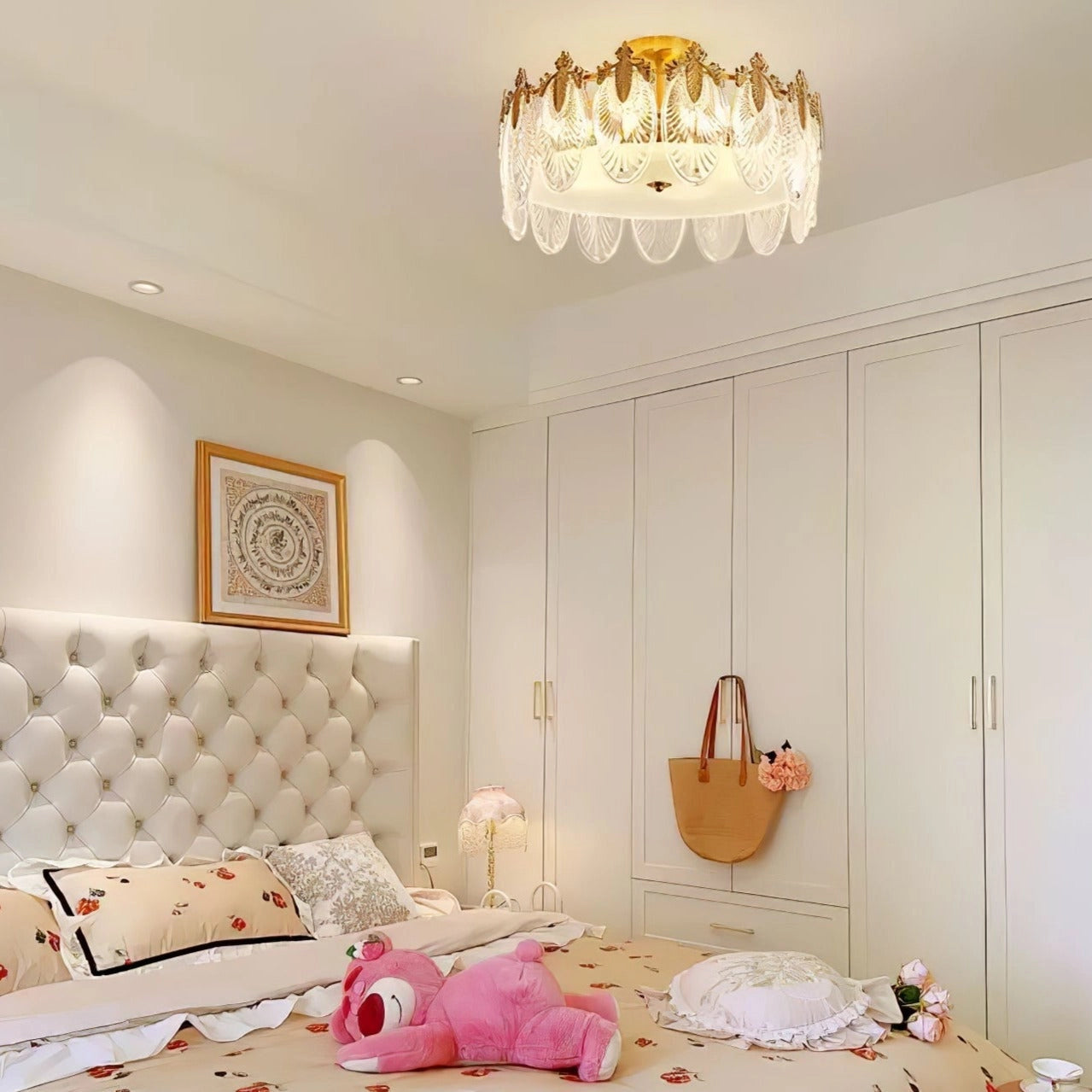 Luxury Crystal Chandelier with Gold Leaf finish, featuring vintage design, hanging from ceiling in a beautifully decorated interior with wooden furniture and elegant lighting.