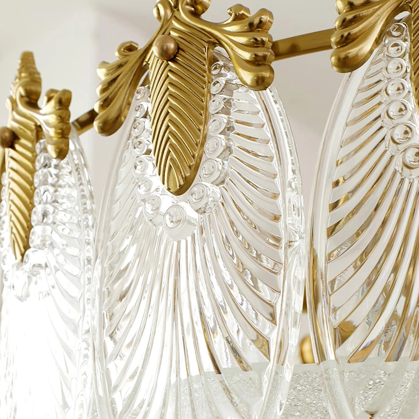 Luxury crystal chandelier with gold leaf finish, vintage ceiling light fixture, featuring intricate metal and crystal detailing.