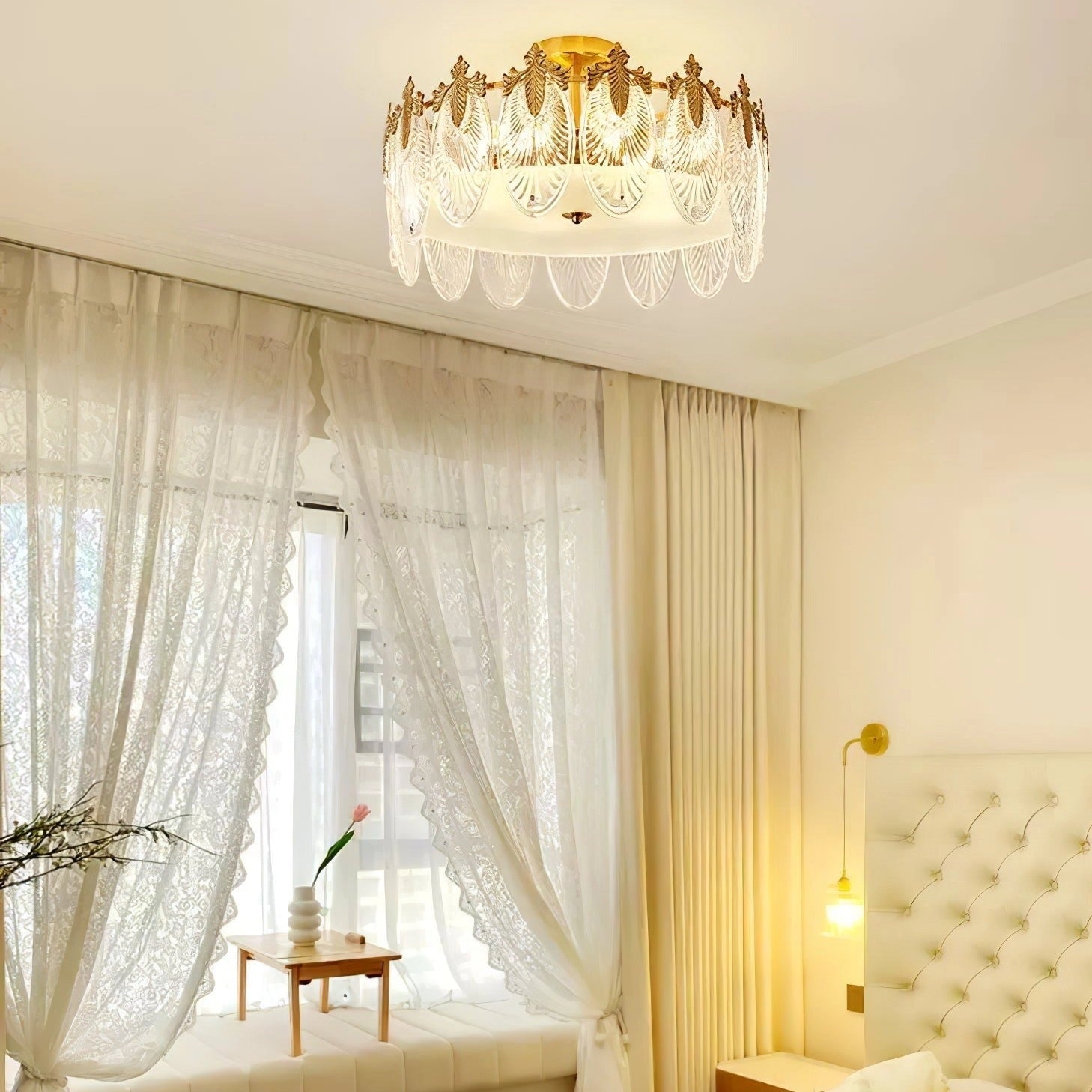 Luxury crystal chandelier with gold leaf finish, vintage ceiling light fixture illuminating a stylish interior with wooden elements, decorative plants, and elegant curtains.