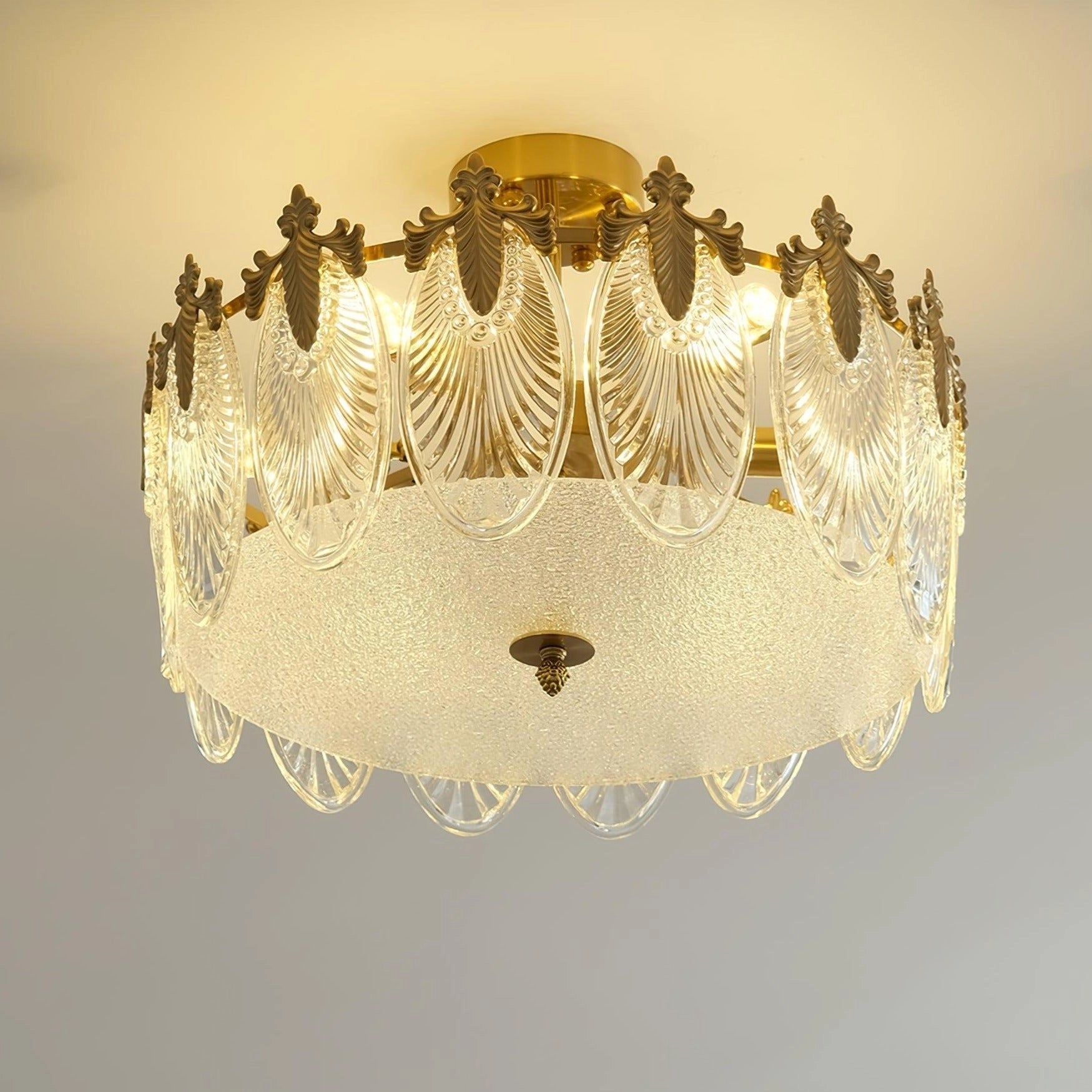 Luxury crystal chandelier with gold leaf detailing, vintage ceiling light fixture, featuring intricate crystal embellishments and a circular design.