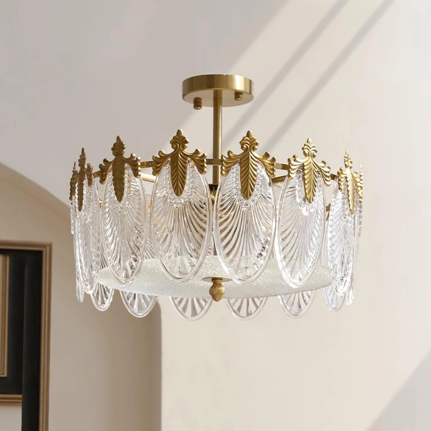 Luxury crystal chandelier with gold leaf vintage design featuring six heads, copper and clear finishes, hanging from a ceiling in a room with a window and wooden elements.
