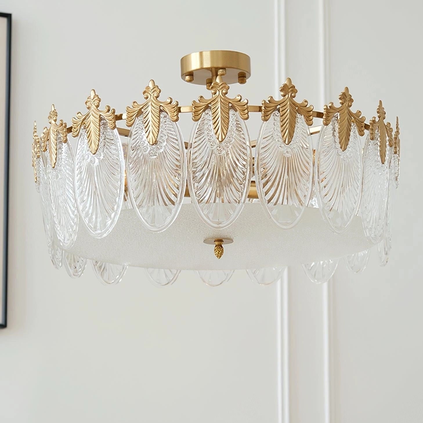 Luxury crystal chandelier featuring gold leaf vintage design, hanging from ceiling with intricate ornamental details and sparkling crystal accents.