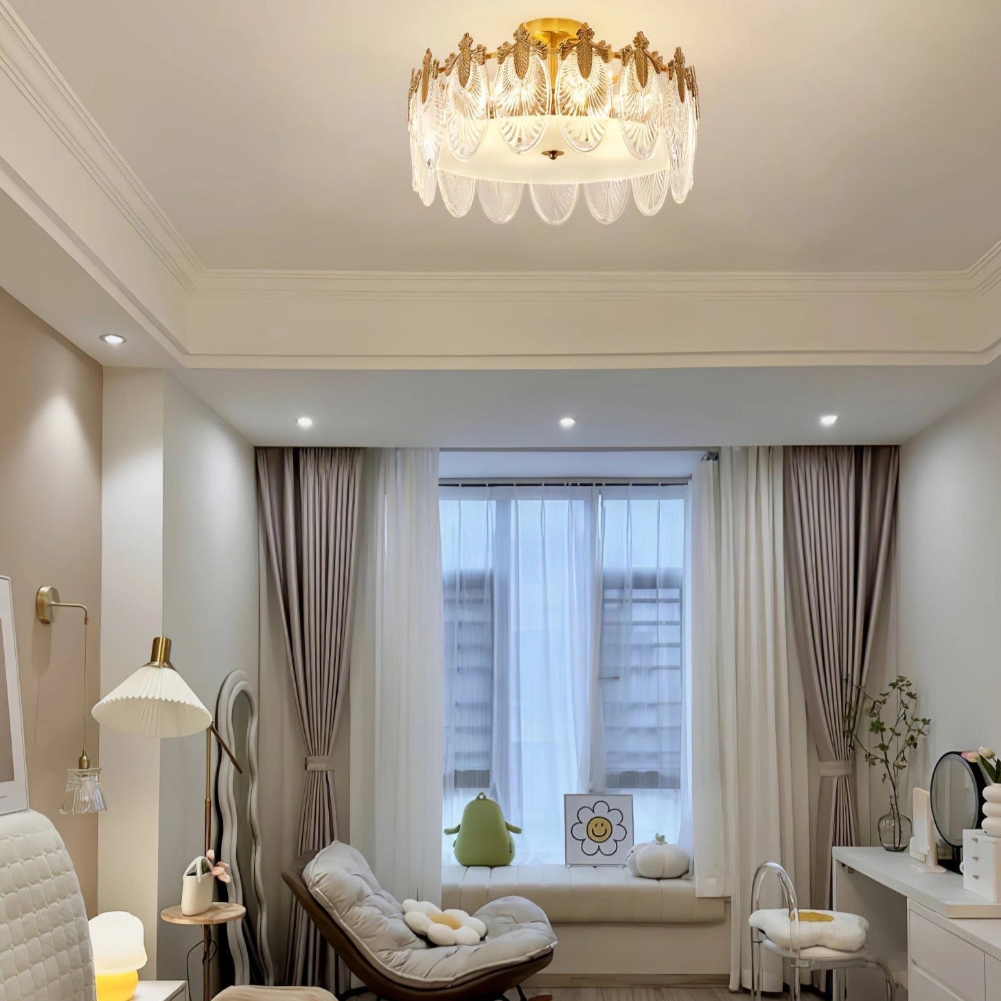 Luxury crystal chandelier with gold leaf accents, vintage ceiling light fixture illuminating a stylish living room interior.