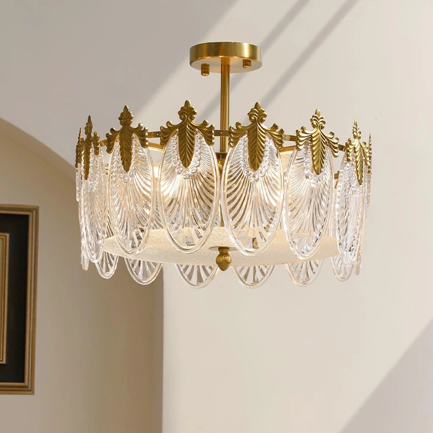 Luxury crystal chandelier with gold leaf finish, vintage ceiling light fixture with intricate design and hanging crystals.