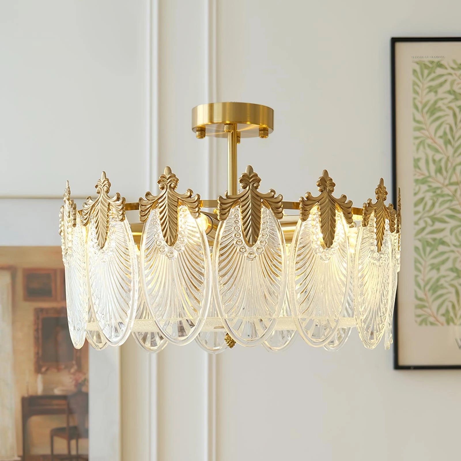 Luxury crystal chandelier with gold leaf detailing hanging from a vintage ceiling, elegantly placed in a decorated room with wooden accents and curtains.