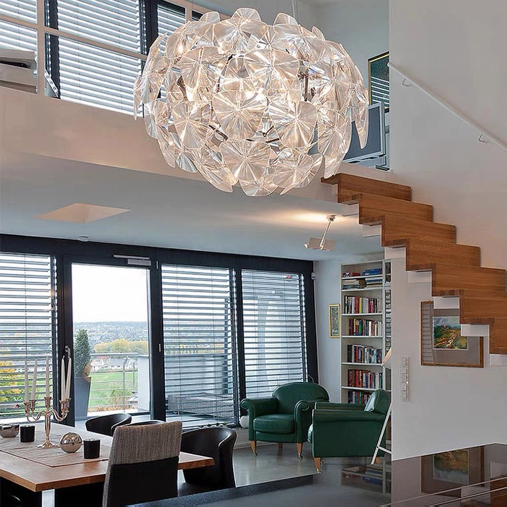 Luxury crystal pendant light with modern glass design, measuring 43.3 inches, elegantly hanging in a stylish interior setting.