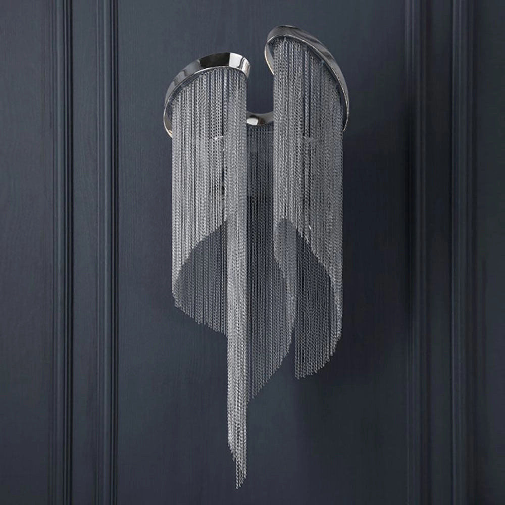 Luxury crystal wall sconce with contemporary chain drape design, featuring a sleek blend of metal and glass elements.