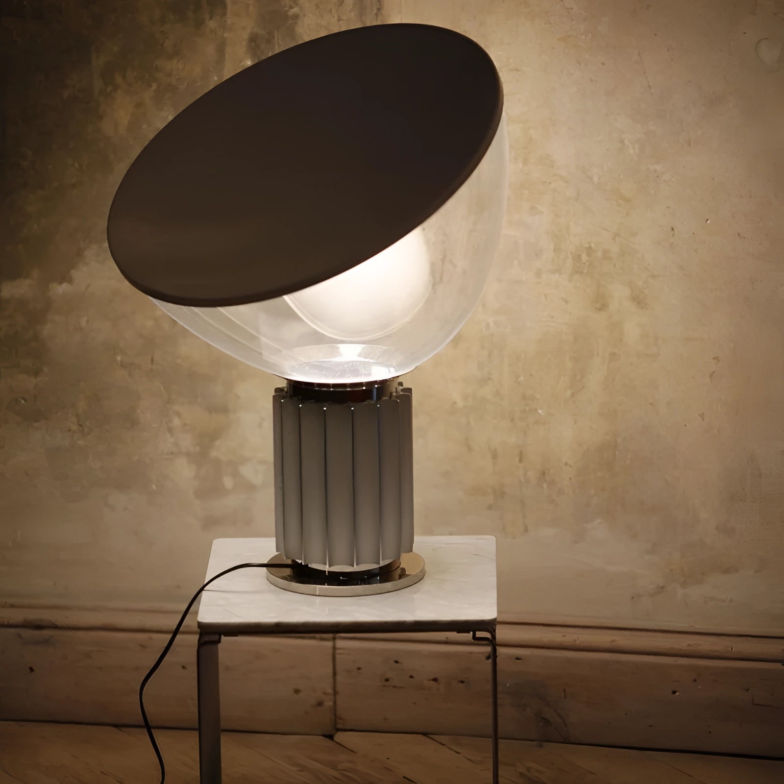 Luxury designer glass lamp with a modern ribbed base and dome shape, featuring elegant tints and shades.