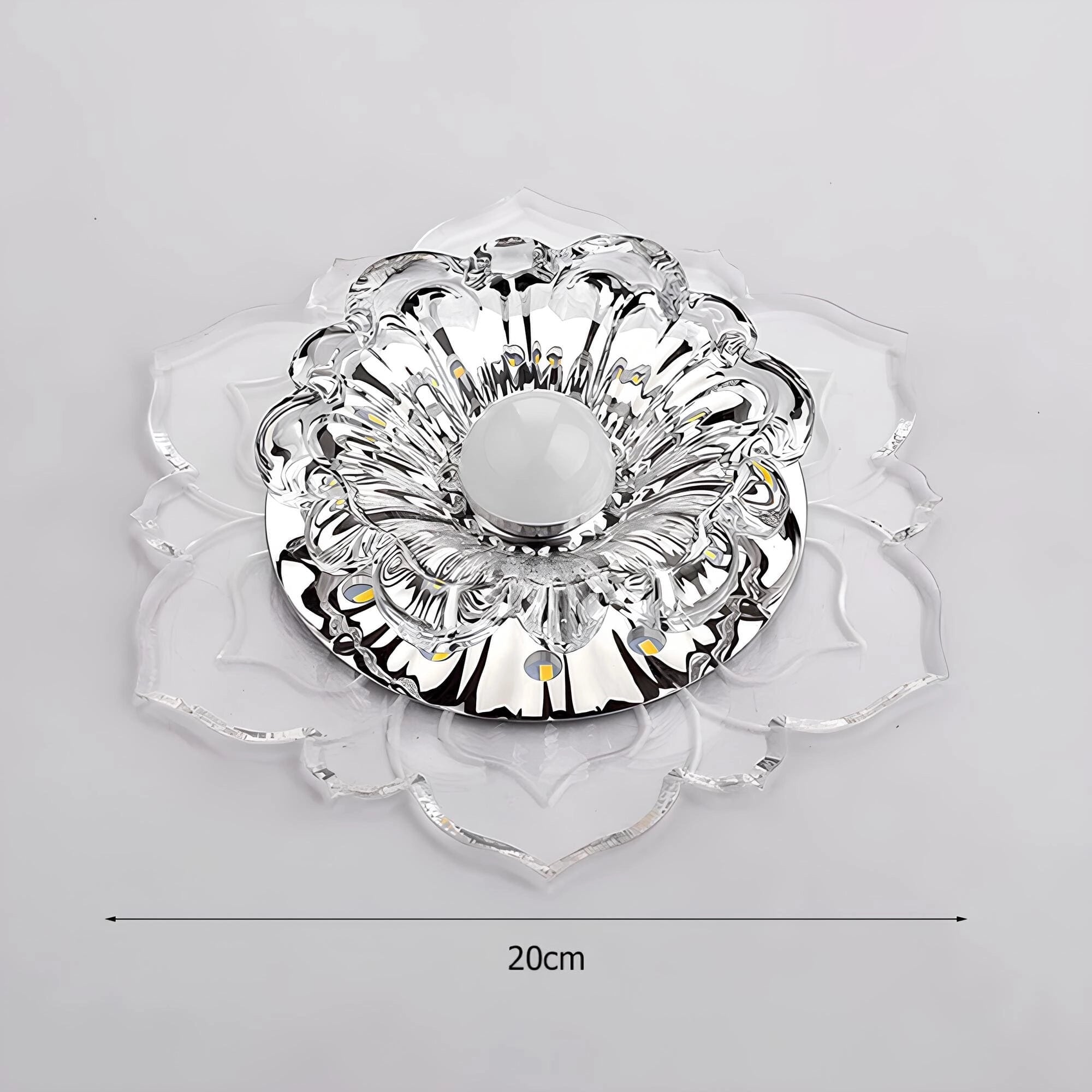 Luxury crystal ashtray featuring a symmetrical floral design with intricate patterns resembling fine jewellery, showcasing high-end craftsmanship and creative artistry in a circular form.