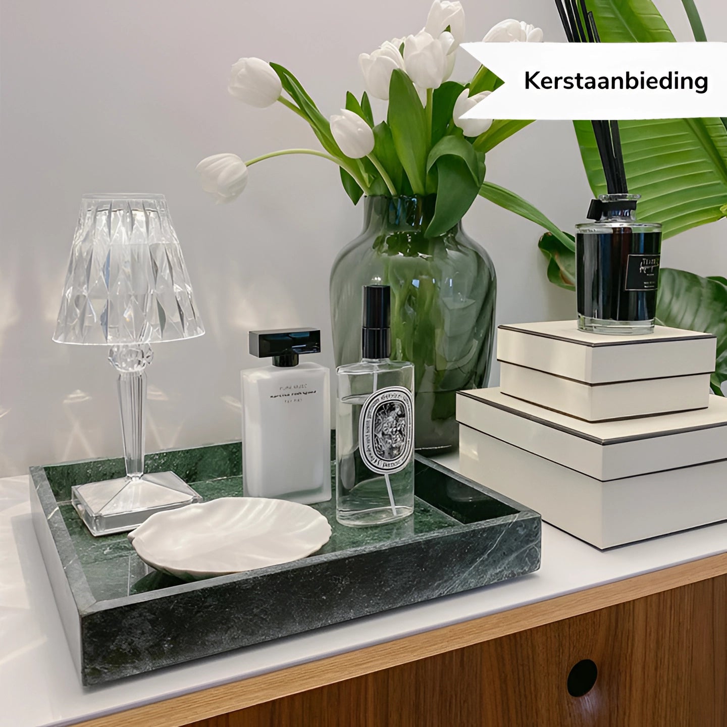 A luxury geometric crystal LED bedside lamp placed on a table, surrounded by elegant tableware and a potted houseplant, creating an upscale and sophisticated interior decor setting.