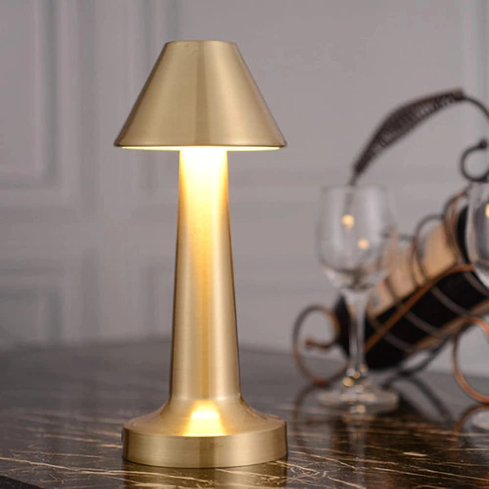 Elegant Luxury Gold Cordless Table Lamp with Amber Lighting, featuring a Wood Base and Glass Lampshade, Perfect for Dining.