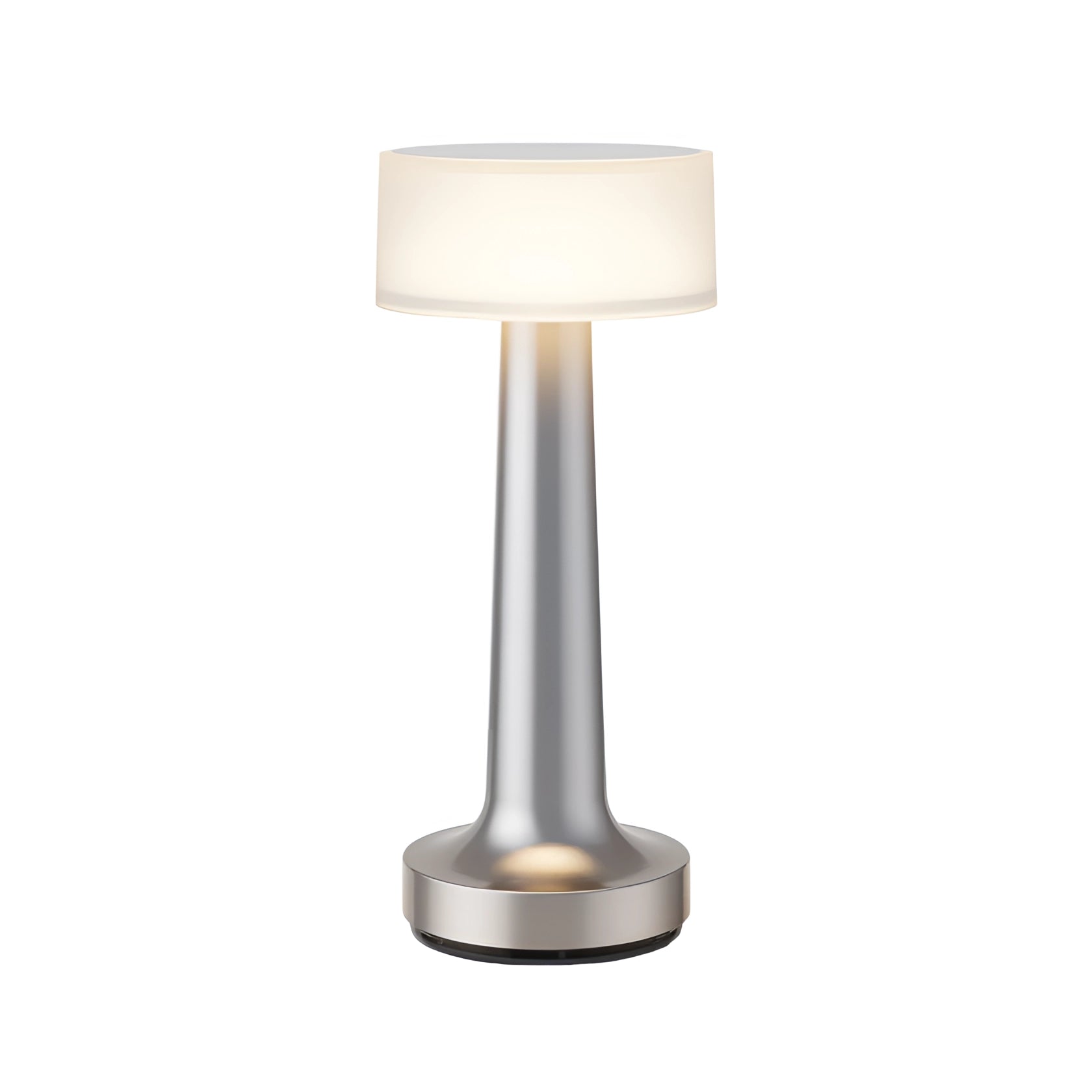 Elegant cordless table lamp in sleek silver finish with a radiant glow, featuring a metal base and a modern lampshade, perfect for sophisticated dining and interior decor.