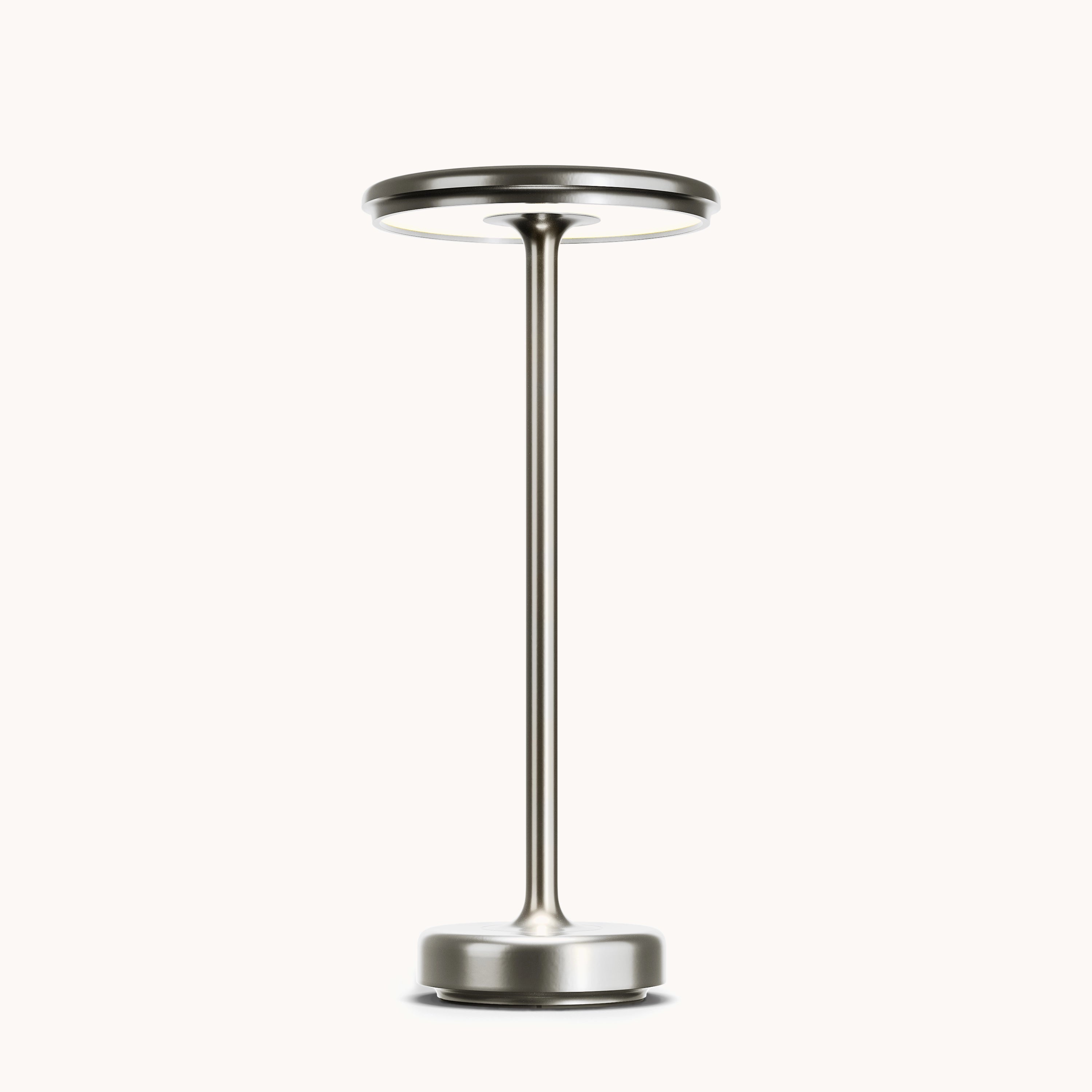 A modern minimalist floor lamp with a slender silver base and a cylindrical LED light, designed with a luxury gold finish.