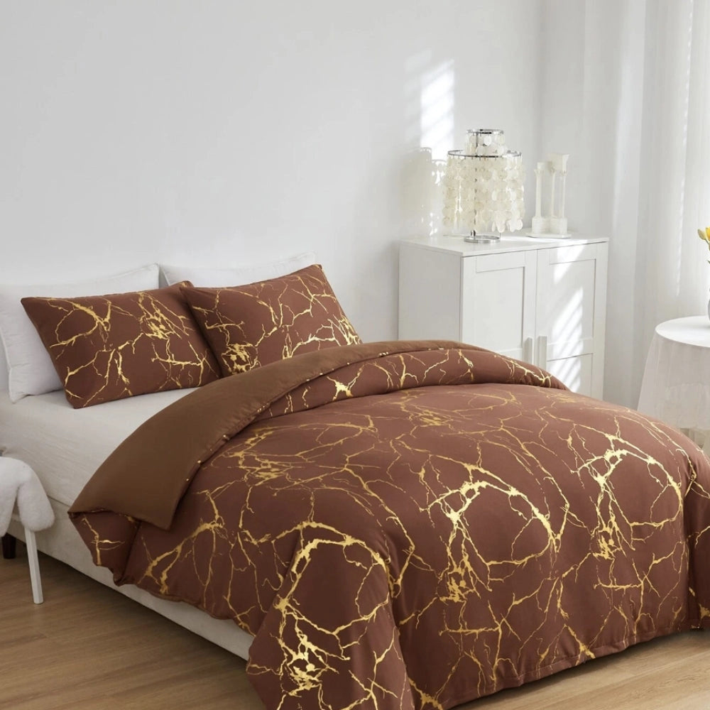 Luxury gold marble bedding set on a modern bed with a wooden bed frame, surrounded by a well-designed interior featuring hardwood flooring and a stylish lamp, creating a comfortable and elegant bedroom atmosphere.