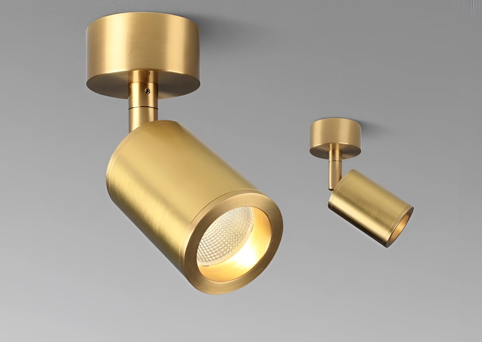 Luxury gold wall lamp with modern minimalistic design, featuring a cylindrical shape and elegant metal finish, perfect for sophisticated lighting in any room.