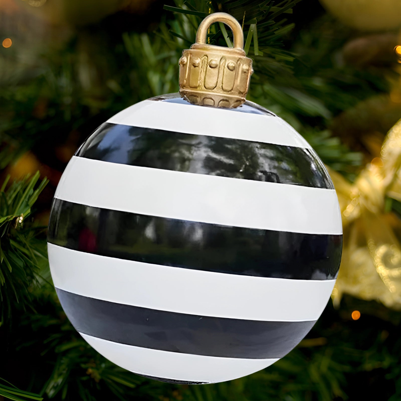 Luxury red plaid tartan glass Christmas ornament hanging on a lush evergreen Christmas tree, beautifully reflecting holiday lights and adding a unique decorative touch to the festive setting.