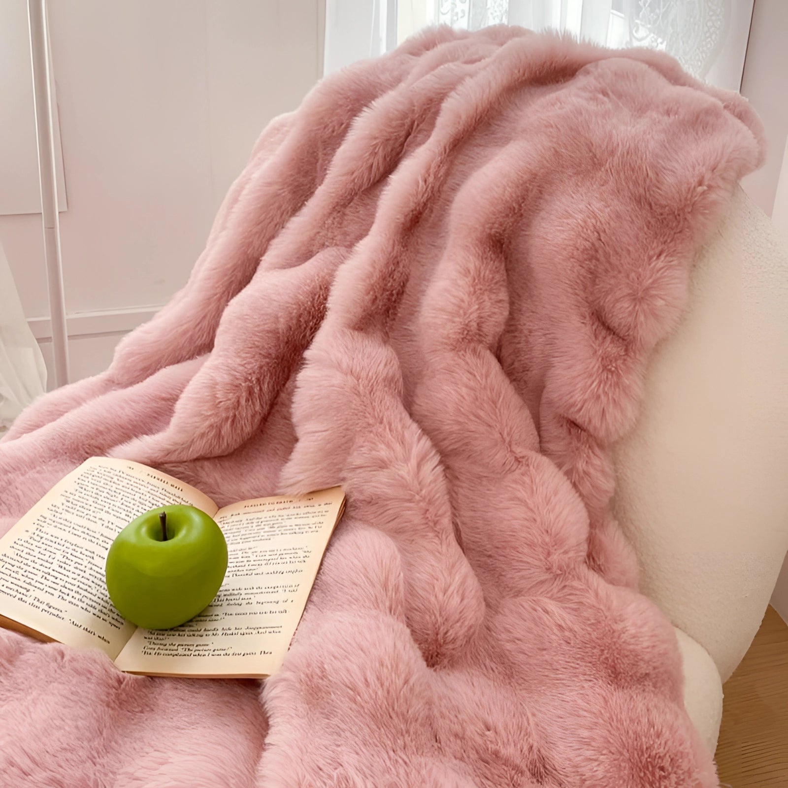 Luxurious white faux fur accent chair with a plush, cozy design, featuring a pink color variant; ideal for creating a comfortable reading nook.