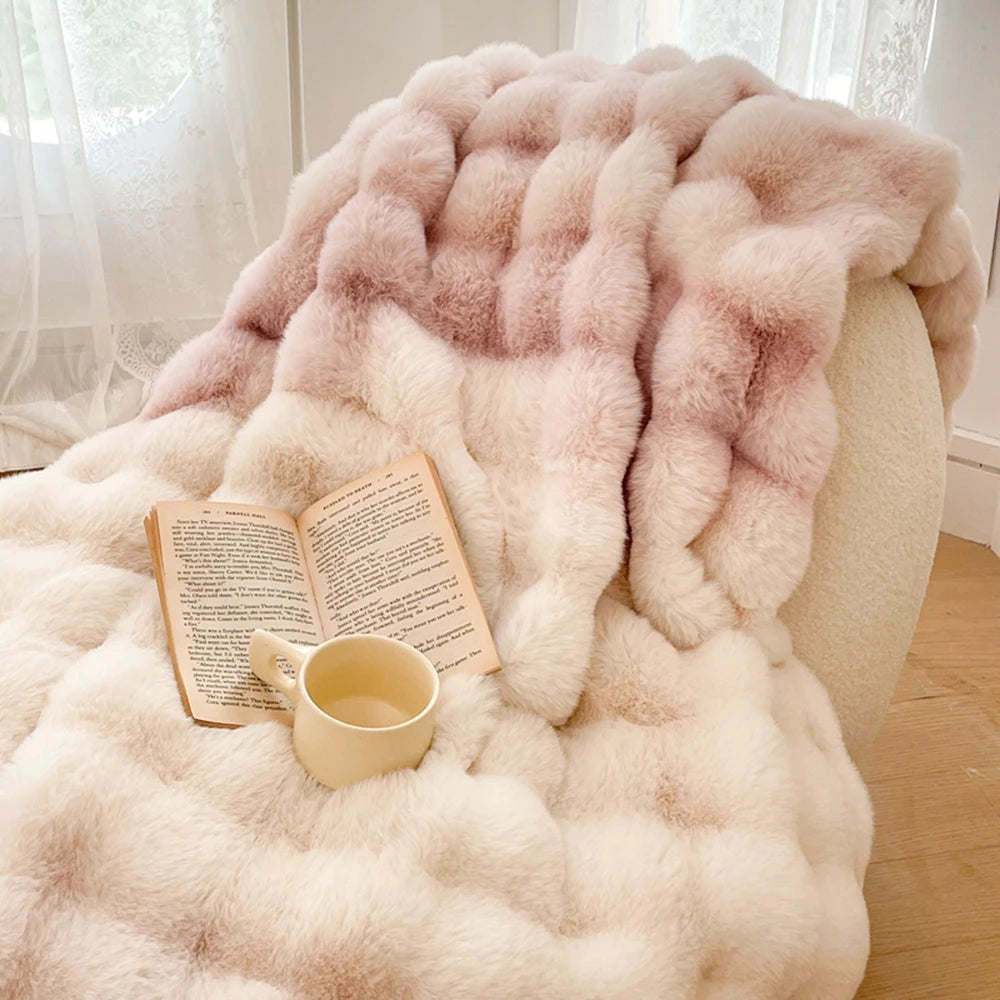 Light pink luxury faux fur accent chair with a plush and cozy design, perfect for a reading nook. A hand is holding a cup, showcasing the drinkware and gesture, with focus on serveware and nail details.